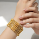 21 Carat Gold Granulation Ball Honeycomb Bangle Set of 6 | 62.460g Total - Image 2