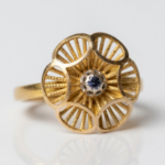 21K Gold Baby Ring - Flower Design with Blue Sapphire Center (0.930g)