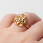 21K Gold Baby Ring - Flower Design with Blue Sapphire Center (0.930g) - Image 2