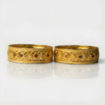 21 Carat Gold Flat Openwork Floral Bangle Pair | 30.850g Total