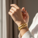 21 Carat Gold Dome Floral Engraved Bangle Pair | 16.540g Total - Image 2