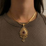 21 Carat Gold Teardrop Locket with Ruby Center Stone | 4.740g - Image 2