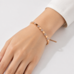 21 carat Gold-Tone Hexagon Stone Accent Bangle Bracelet with Safety Chain - Image 2