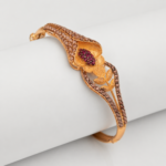 21 Carat Gold-Tone Floral Openwork Bangle Bracelet with Pink Stone Accents