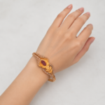 21 Carat Gold-Tone Floral Openwork Bangle Bracelet with Pink Stone Accents - Image 2