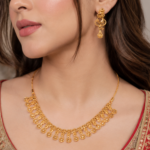 21 Carat Gold-Tone Layered Necklace Set with Drop Design Earrings - Image 2