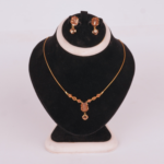 21 Carat Gold-Tone Geometric Pendant Necklace Set with Earrings