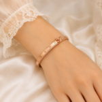 21 carat Gold-Tone Heart Stone Openwork Bangle Bracelet - Image 2