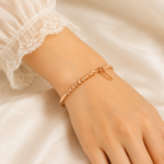 21 carat Gold-Tone Geometric Bead Bangle Bracelet with Safety Chain - Image 2